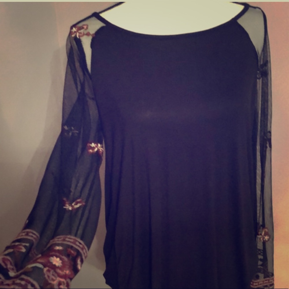 Maurices black top with sheer embellished sleeves